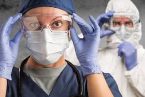Doctors wearing Personal Protective Equipment